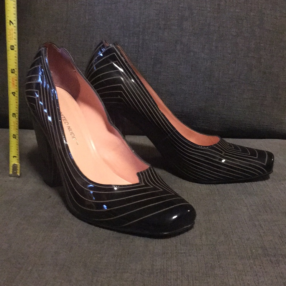 United Nude black patent leather Art Deco heels.